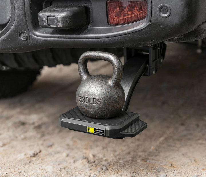 Rock-solid retractable truck bed step with a tested 330 lbs load capacity.