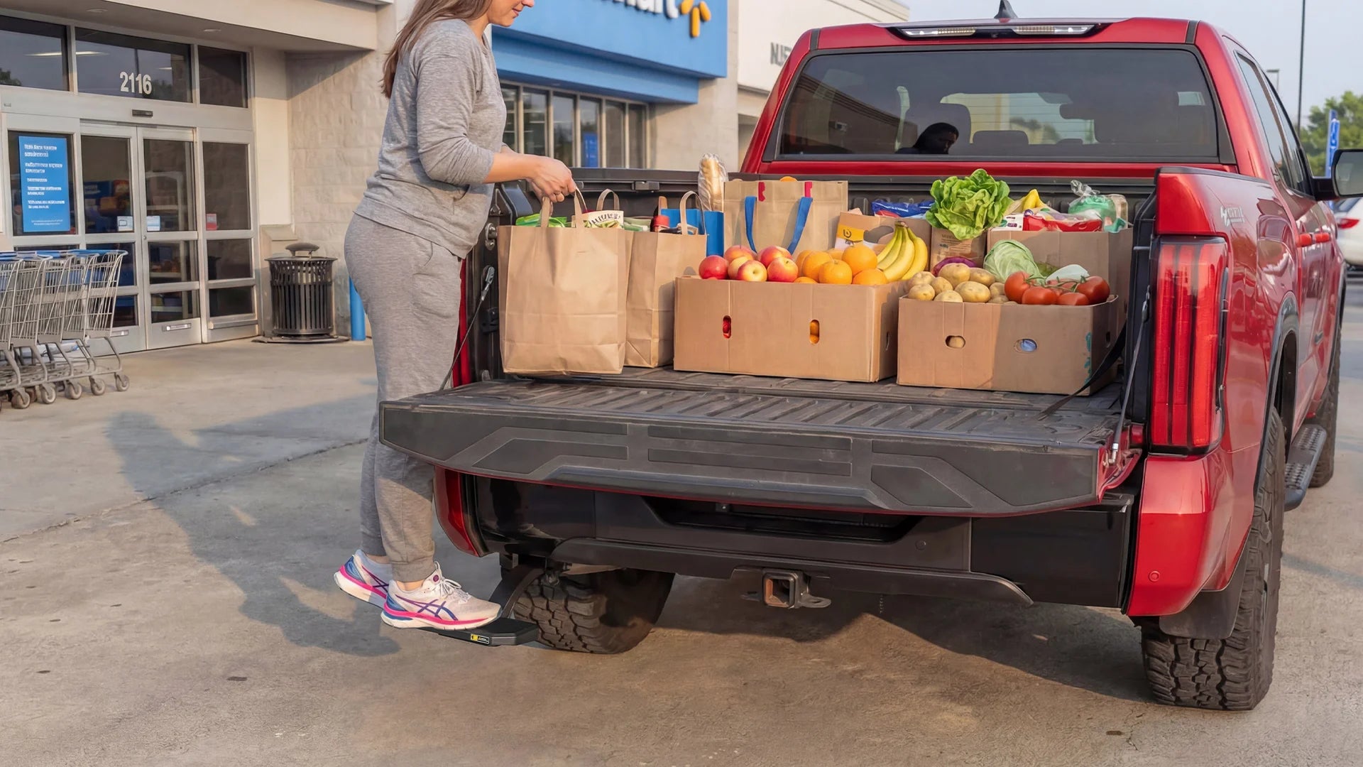 Using Wolfbox Retractable Bed Step for easy grocery loading into the truck bed - Daily convenience for errands.