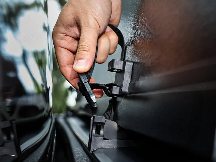 High-strength clips snap tightly to keep folded panels stable on bumpy trails.