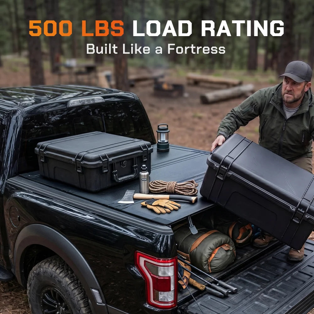 ToughFold T1 hard tri-fold truck bed cover supporting 500 lbs load capacity with camping and work gear loaded on pickup truck