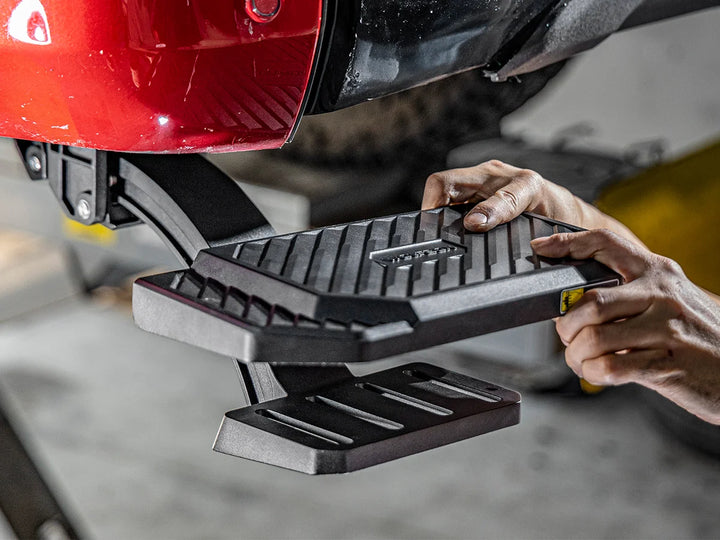 Wolfbox Retractable Bed Step made of heavy-duty die-cast aluminum for rust resistance and long-lasting durability.