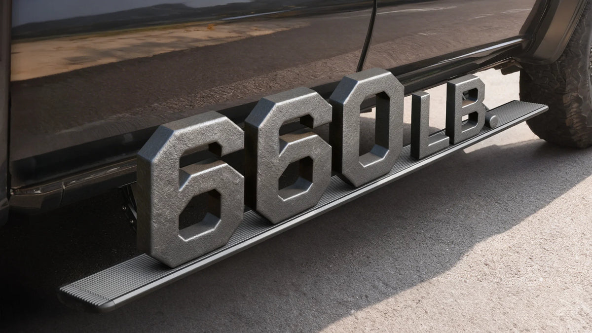 Heavy-duty die-cast aluminum power running boards supporting 660 lbs for solid and secure stepping.