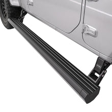 Black electric running board fully deployed on a silver Jeep, showing the low step position for easy cabin entry and exit on SUVs and pickup trucks.