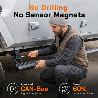 Mechanic installing a Wolfbox electric running board under a Jeep without drilling, using factory CAN-Bus wiring and cutting installation time by 60 percent.