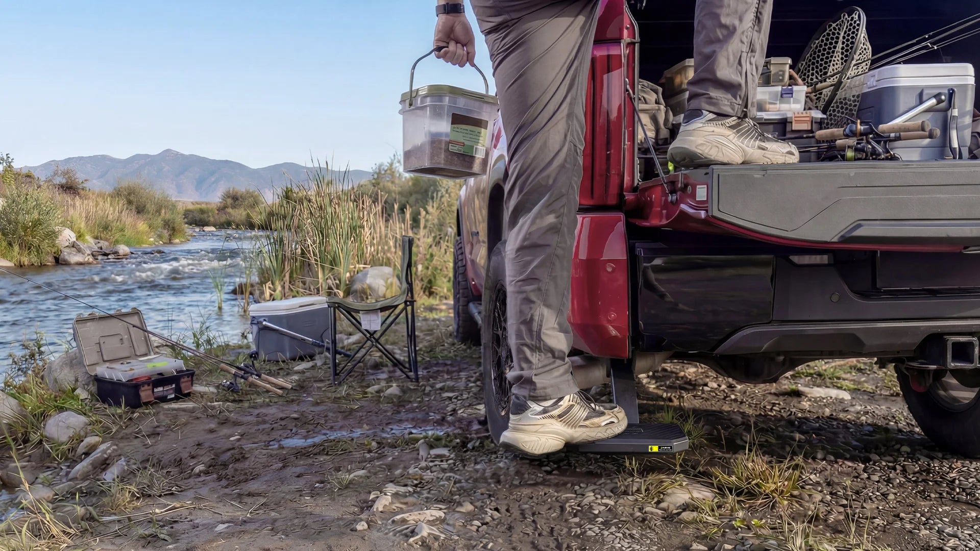 Wolfbox Retractable Step for camping and fishing adventures - Steady access to outdoor gear and coolers in the truck bed.