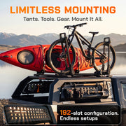 Versatile T-slot compatible truck bed rack for mounting kayaks, bikes, and off-road gear.