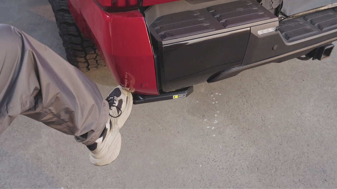 Wolfbox Foot-Activated Bed Step in Action - Experience effortless, pain-free truck bed access with a quick nudge of your foot.